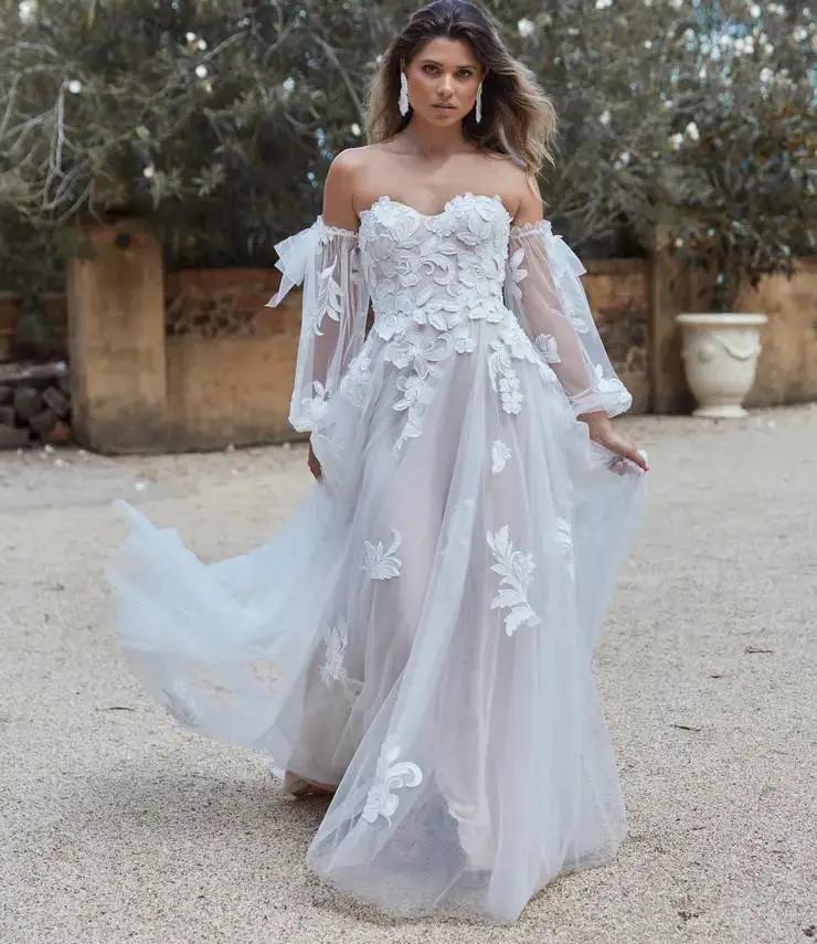 Model wearing a Evie Young gown
