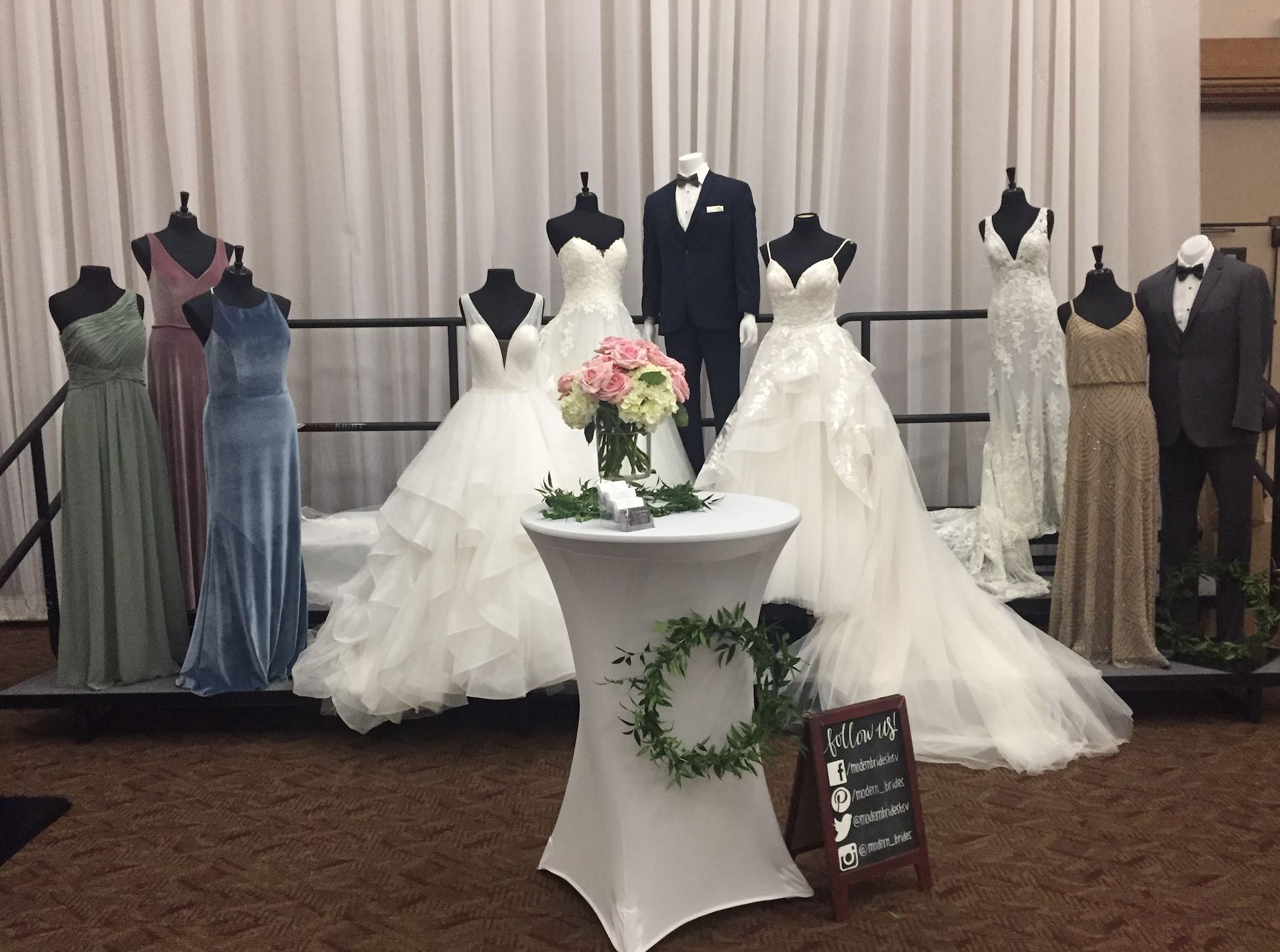 Photo of the bridal gowns and tuxedos
