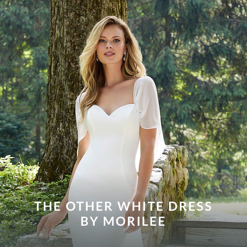 Model wearing a Morilee White Dress gown