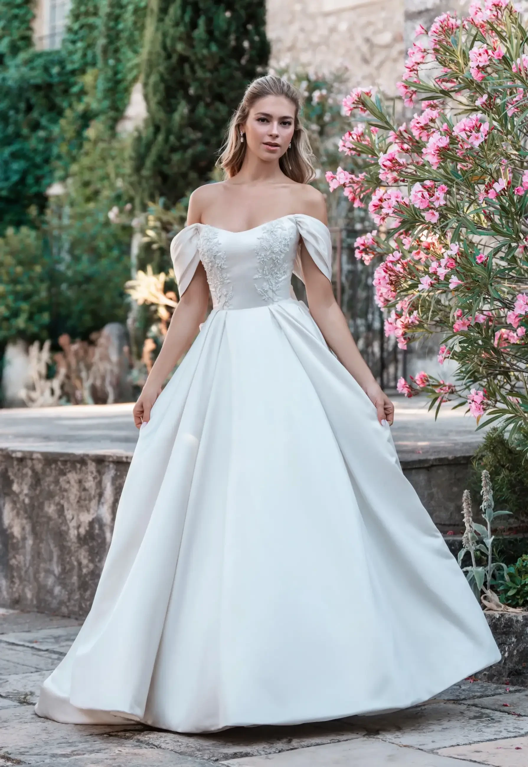 Model wearing a Allure Bridals gown
