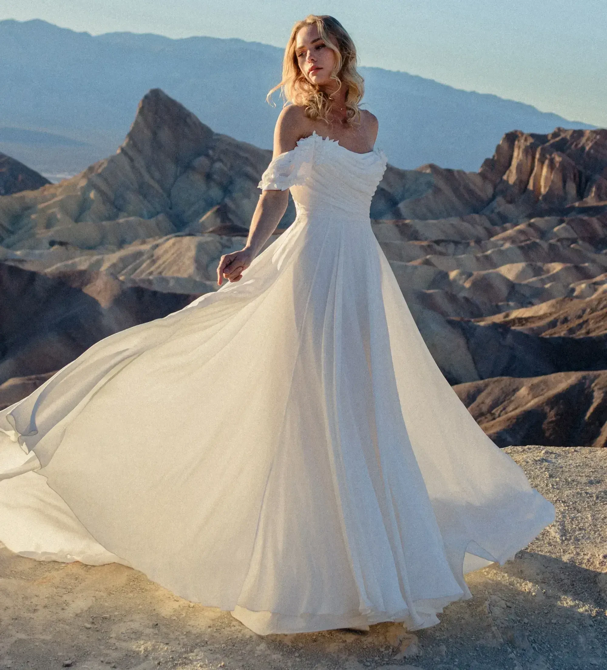 Model wearing a Allure Wilderly Bride gown