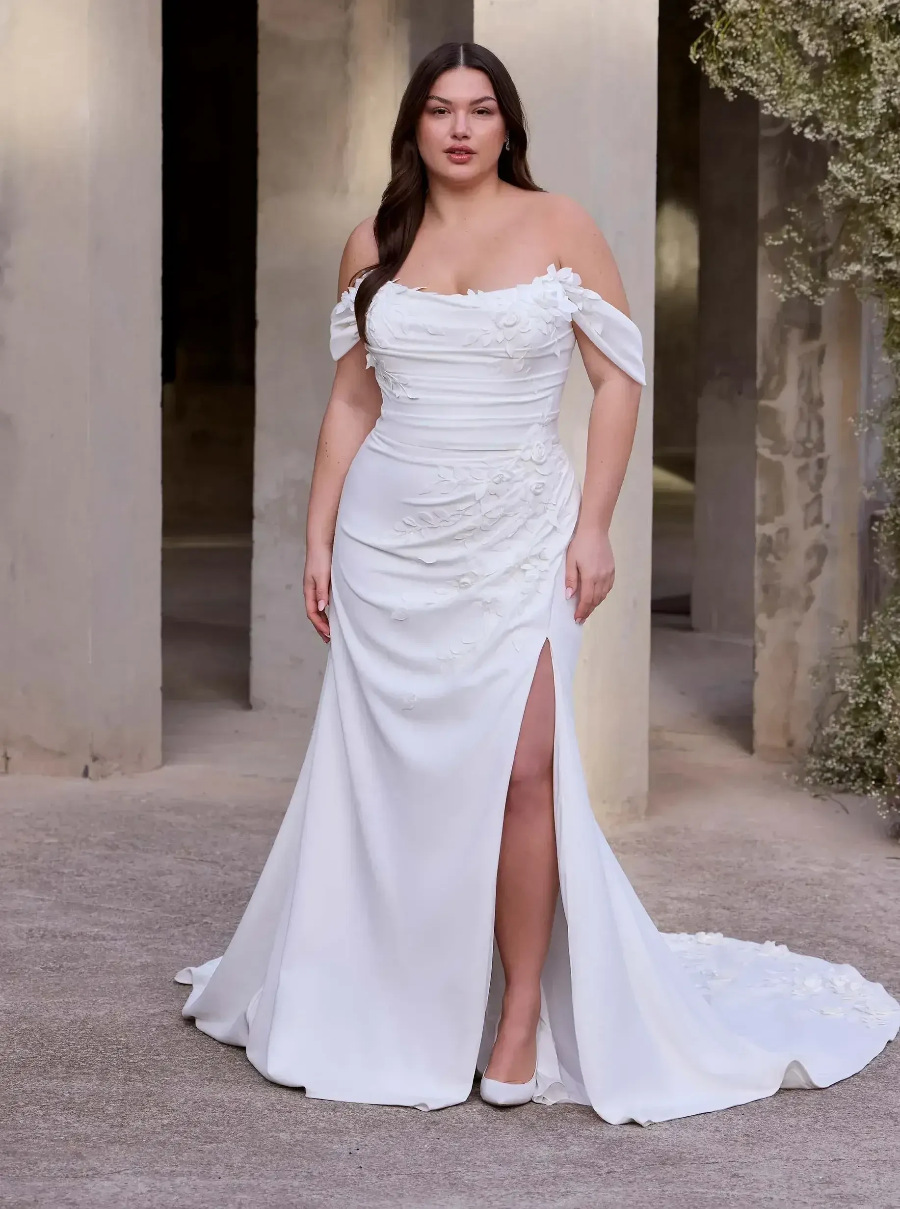 Model wearing a Julietta by Morilee gown