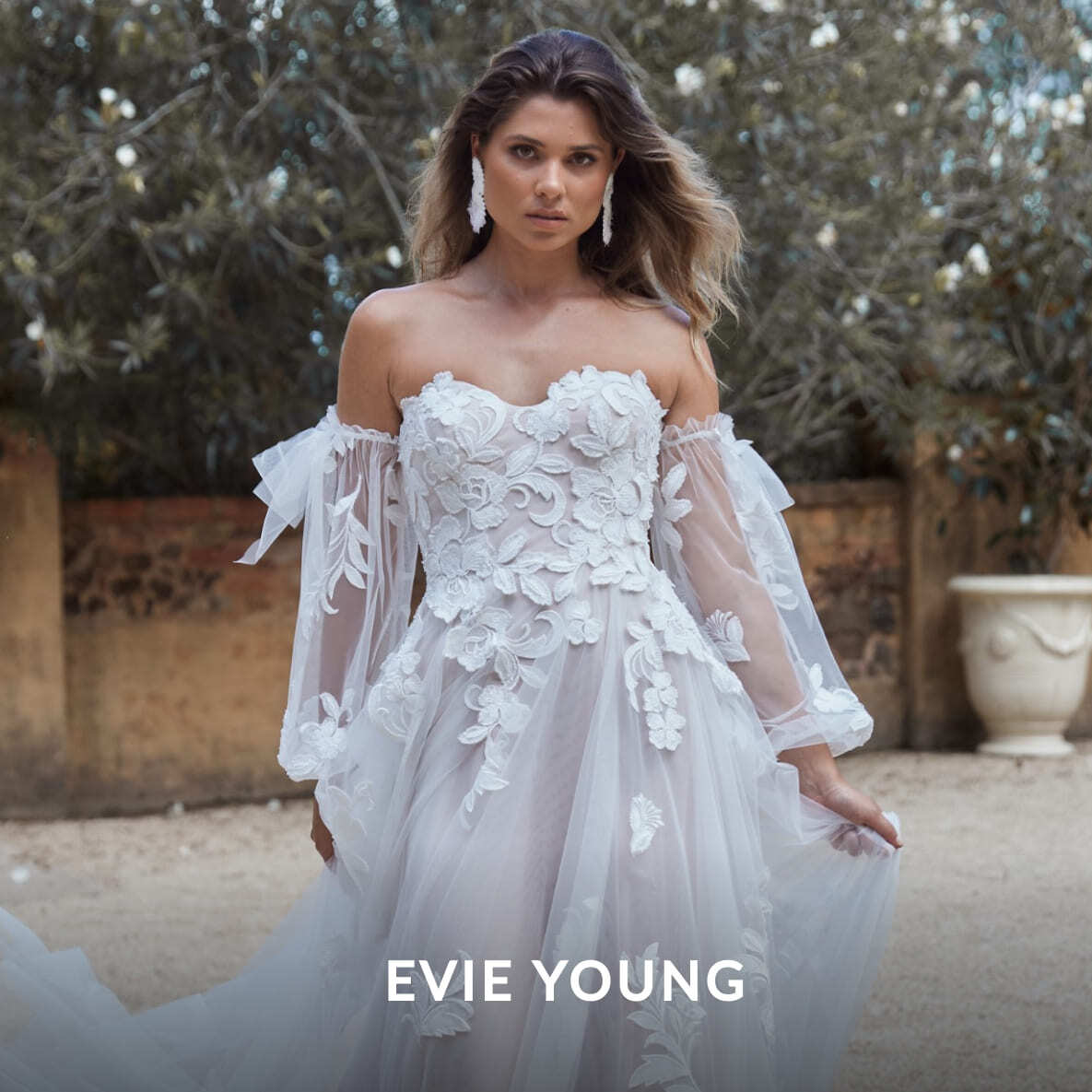 Model wearing a Evie Young gown